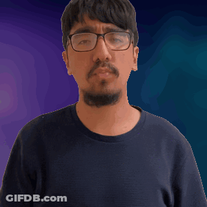 Man With Glasses And Beard Making Gesture GIF