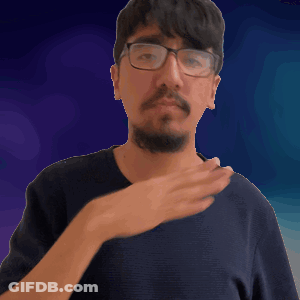 Man With Glasses And Beard Making Gesture GIF