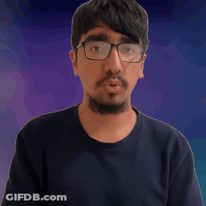 Man With Glasses And Beard Making Gesture GIF