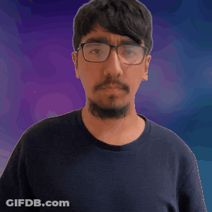 Man With Glasses And Beard Making Hand Gesture GIF
