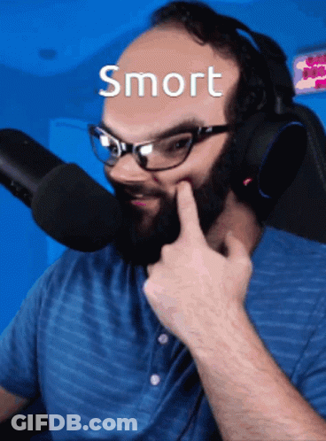 Man With Glasses And Beard Pointing At Face Saying Smrt GIF
