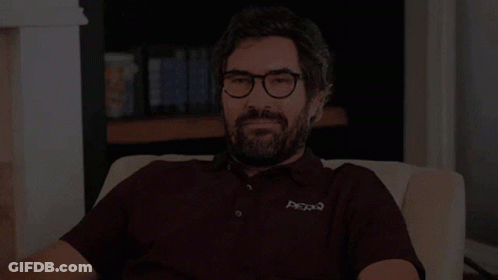 Man With Glasses And Beard Saying Hi There GIF