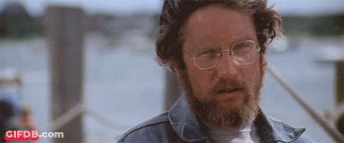 Man With Glasses And Beard Saying Jaws GIF