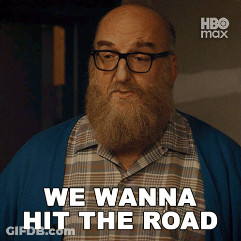Man With Glasses And Beard Saying We Wanna Hit The Road GIF