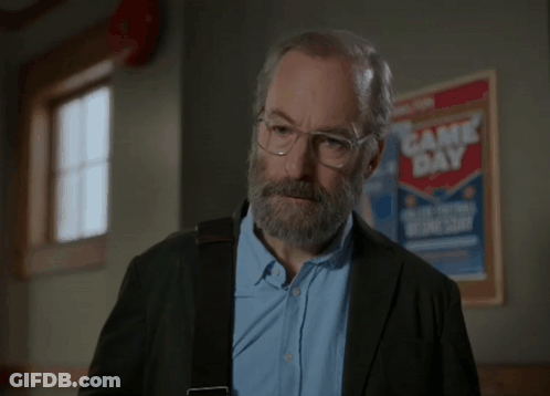 Man With Glasses And Beard Saying Would You Accept An E-Middle Finger GIF