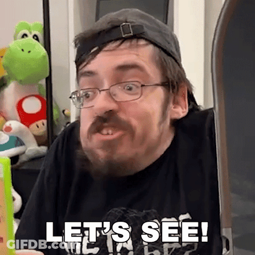 Man With Glasses And Beard Says Let's See GIF