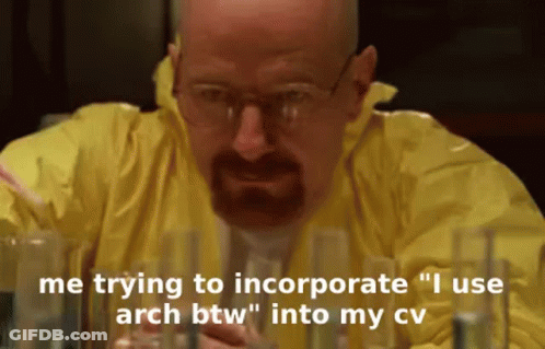 Man With Glasses And Beard Sitting With Straw In Mouth GIF