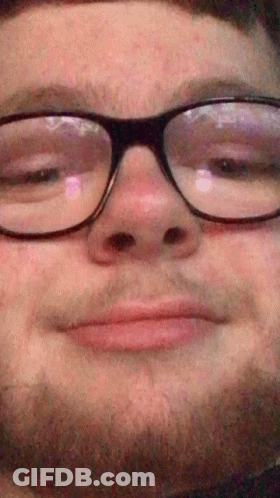 Man With Glasses And Beard Smiling GIF