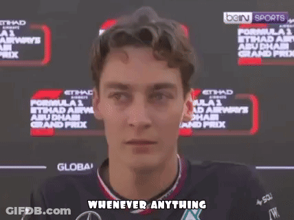 Man With Glasses And Beard Smiling Says Try It GIF