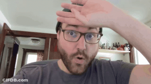 Man With Glasses And Beard Surprised Hand On Forehead GIF