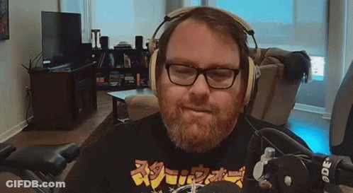 Man With Glasses And Beard Wearing Headphones GIF