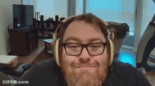 Man With Glasses And Beard Wearing Headphones GIF