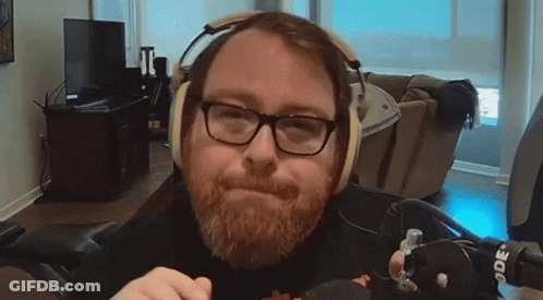 Man With Glasses And Beard Wearing Headphones GIF