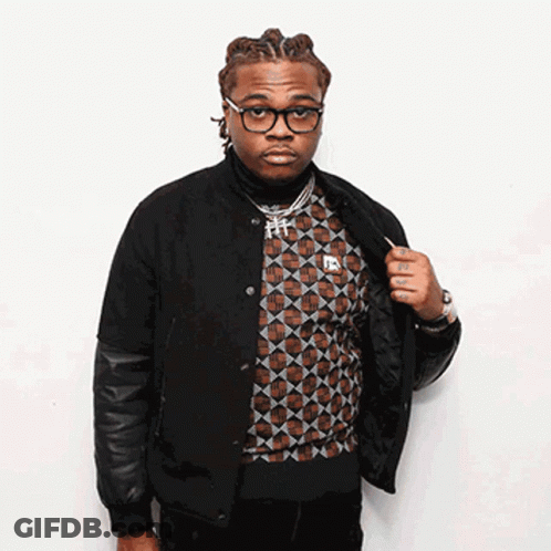 Man With Glasses And Black Jacket Showing Wrist Tattoo GIF