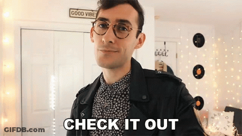 Man With Glasses And Black Leather Jacket Says Check It Out GIF