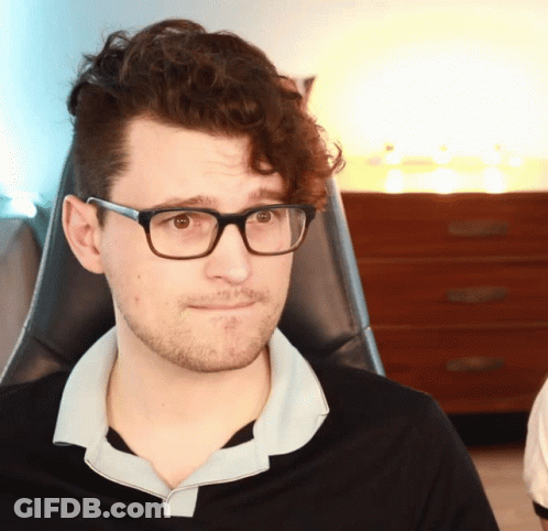 Man With Glasses And Black Shirt Looking To Side GIF