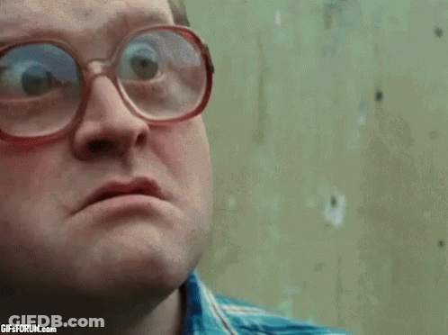 Man With Glasses And Blue Shirt Making Funny Face GIF