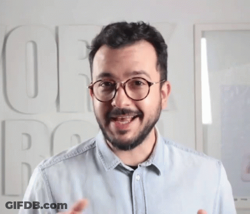Man With Glasses And Blue Shirt Saying OE GIF