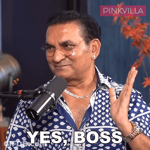 Man With Glasses And Blue Shirt Saying Yes Boss GIF
