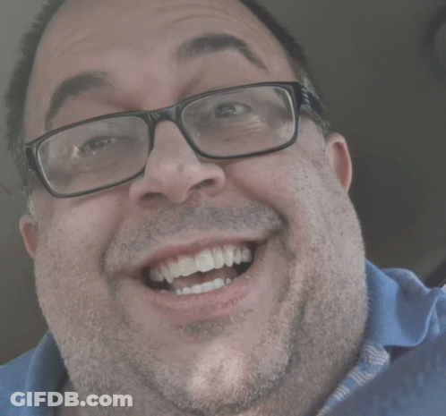 Man With Glasses And Blue Shirt Smiling GIF