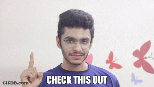 Man With Glasses And Blue Shirt With Check This Out Written GIF