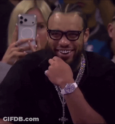 Man With Glasses And Cross Necklace Smiling GIF