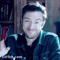 Man With Glasses And Denim Jacket Thumbs Up GIF