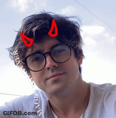 Man With Glasses And Devil Horns In Hair GIF