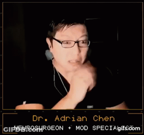 Man With Glasses And Ear Buds Talking To Dr. Adrian Chen GIF