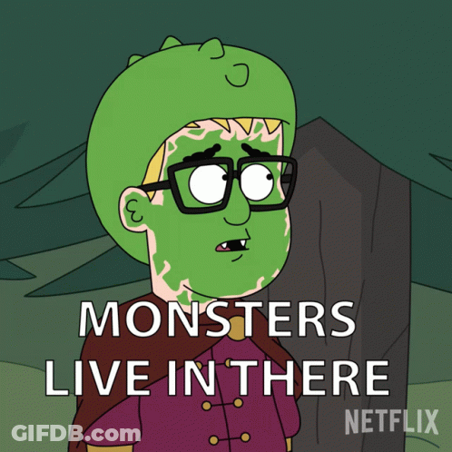 Man With Glasses And Green Mask Saying Monsters Live In There GIF