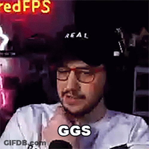 Man With Glasses And Hat At Microphone GIF