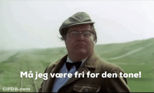 Man With Glasses And Hat In Field Saying Ma Jeg Vare Fri For Den Tone GIF