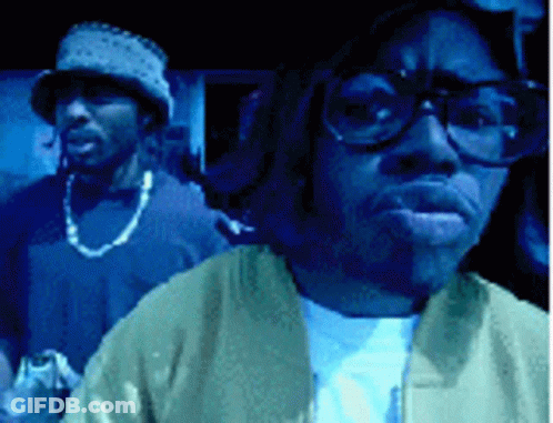 Man With Glasses And Hat Next To Man With Hat GIF