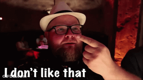 Man With Glasses And Hat Pointing At Nose Saying I Don't Like That GIF