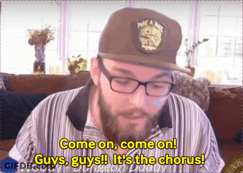 Man With Glasses And Hat Saying Come On Guys It's The Chorus GIF