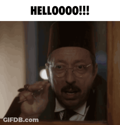 Man With Glasses And Hat Saying Hellooooo GIF