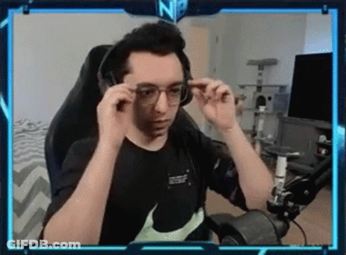Man With Glasses And Headphones At Computer GIF