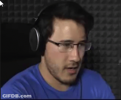 Man With Glasses And Headphones At Computer GIF