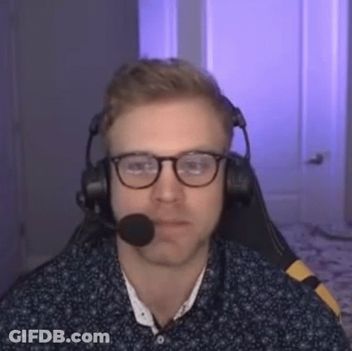Man With Glasses And Headphones At Computer GIF