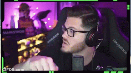 Man With Glasses And Headphones At Microphone GIF