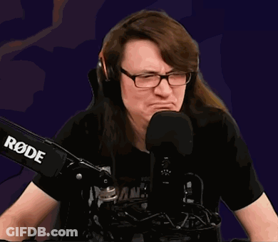 Man With Glasses And Headphones At Microphone GIF