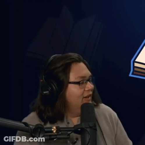Man With Glasses And Headphones At Microphone GIF