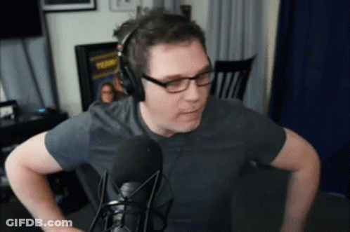Man With Glasses And Headphones At Microphone GIF