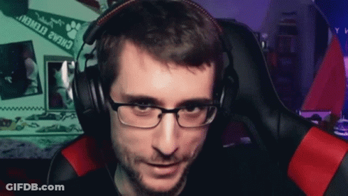 Man With Glasses And Headphones In Gaming Chair GIF