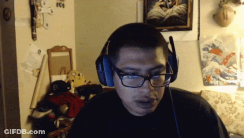 Man With Glasses And Headphones Looking GIF