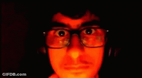 Man With Glasses And Headphones Making Funny Face Moscow GIF