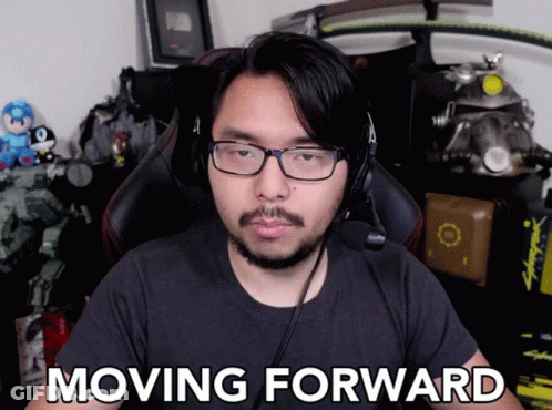 Man With Glasses And Headphones Saying Moving Forward GIF