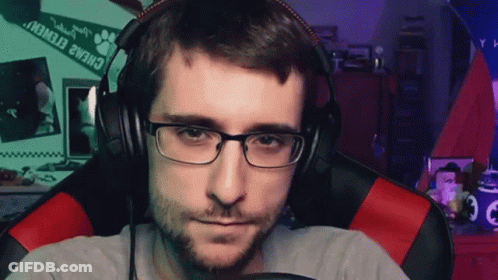 Man With Glasses And Headphones Sitting Near Paw Print GIF
