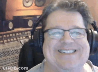 Man With Glasses And Headphones Smiling GIF