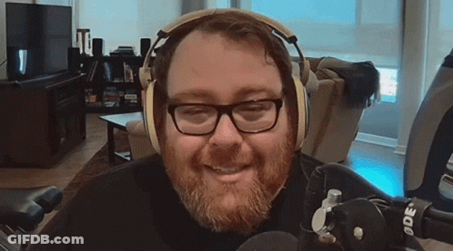 Man With Glasses And Headphones Smiling GIF